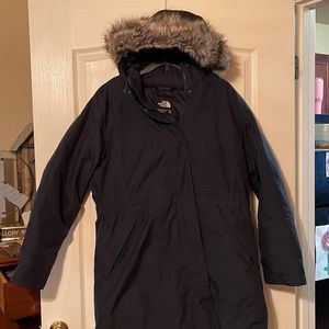 The north face winter coat. Navy blue in color